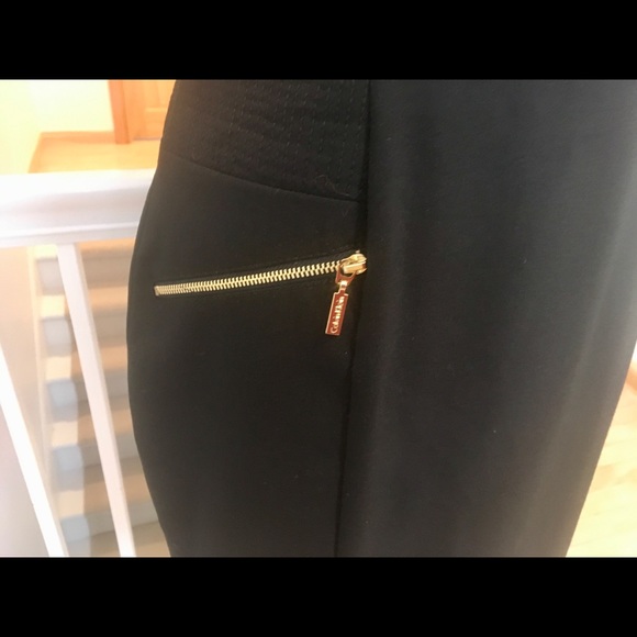 Lovely Calvin Klein black fitted dress, with gold accent pockets. - Picture 9 of 16